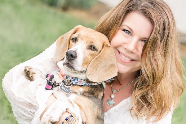 Justine wither her beagle Holly. Justine is a photographer in Bismarck ND with a studio in Hazen